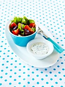 Tomato salad with yoghurt and dill sauce