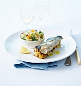 Sardines stuffed with herby breadcrumbs, dried fruit tabbouleh