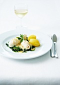 Rolled plaice fillets,potatoes and spinach in creamy onion sauce
