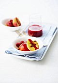 Grilled peaches with raspberry puree