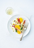 Red and yellow chicory salad with capers and orange