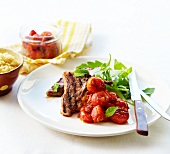 Grilled pork and cherry tomatoes fresh mint
