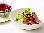 Spicy duck magret with figs and cranberry sauce