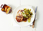 Lamb chops with white grapes,pine nuts and onions