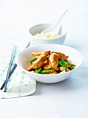 Chicken in curry and peanut sauce, sauteed vegetables with almonds