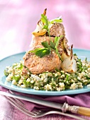 Pork filet mignon with sesame seeds and crushed wheat with parsley