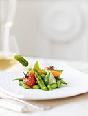 Spring vegetables and a pipette of herb sauce