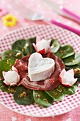 Mixed salad with a cheese heart