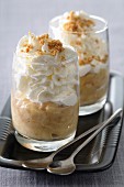 Banana cream with whipped cream and cookie crumbs