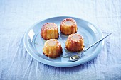 Cannelés with orange blossom syrup