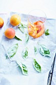 Crushed apricots and crystallized basil leaves
