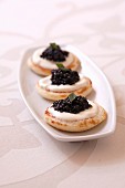 Blinis with tarragon cream and caviar