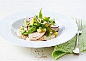 A chicken breast, avocado and pineapple salad