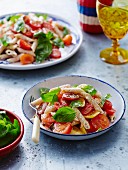 Penne, red and yellow tomato and basil salad