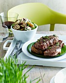 Grilled rump steak with thyme and roasted potatoes