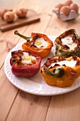 Baked peppers stuffed with tuna and coodled egg