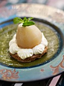 Poached pear on a chestnut shortbread,whipped cream and mint-lemon marmelade