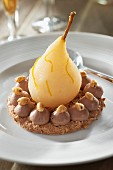 Pear-chocolate delice on a hazelnut Dacquoise