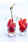Glass of candied tomatoes