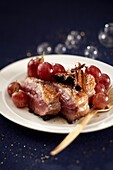 Duck breast with grapes and spices