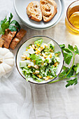 Iceberg lettuce with corn, cucumber and parmesan (vegetarian)