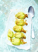 Grilled zucchini flowers stuffed with parmesan