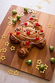 Cinnamon and candied cherry milk bread Christmas tree