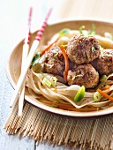 Gluten-free Asian noodles with beef meatballs