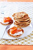 Blinis with thick cream and smoked salmon