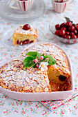 Sour cherry and almond cake in the shape of a heart