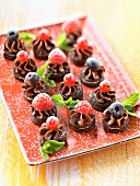 Mini Oreo biscuit,chocolate ganache and raspberry bites