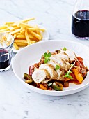 Chicken breast supreme,ratatouille and French fries,red wine