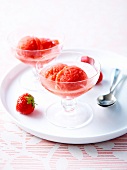 Dishes of Champagne rosé and strawberry sorbet