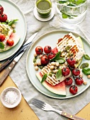 Grilled halloumi with watermelon, roasted cherry tomatoes and chickpeas