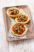 Chanterelle and tomato tartlets