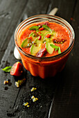 Watermelon and tomato gaspacho with thin slices of avocado