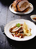 Roasted turkey stuffed withgingerbread,mashed potatoes and diced potatoes with summer fruit coulis