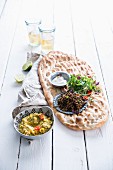 Moroccan-style crispbread, minced meat and broad bean pesto with chilli