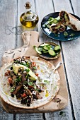 Mexican burrito with beef, black beans and avocado