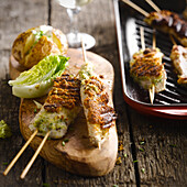 Grilling turkey brochettes with crisp herb coating