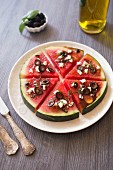 Watermelon 'pizza' with feta cheese and black olives