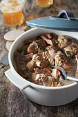Rabbit and Andouille stew in creamy cider sauce