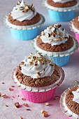 Gluten-free chocolate muffins with meringue topping