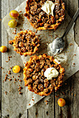 Mirabelle cupcakes with quinoa-oat crumble