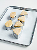 Baked sponge cake in various moulds