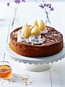 Honey and pear cake with almond cream and borage