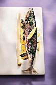 Grilled mackerel with parsley, oil and lemon with mustard sauce