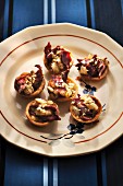 Duck magret,pear and pine nut mini tartlets