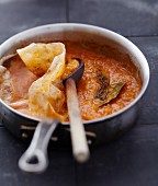 Preparing homemade tomato sauce