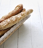 Assortment of baguettes in a bread basket